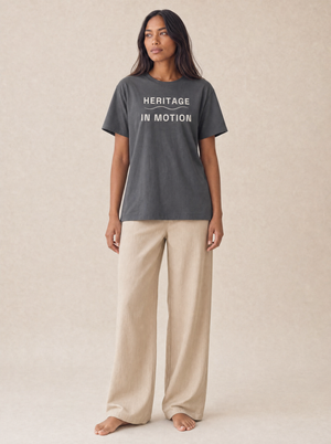 Coast Anthem Tee in Ink with ivory Heritage in Motion print, front on model