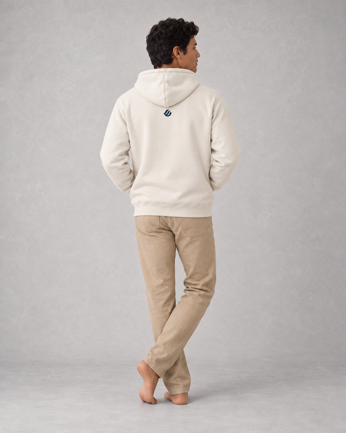 Amihan Hoodie in Bone, back on model with small navy printed wave
