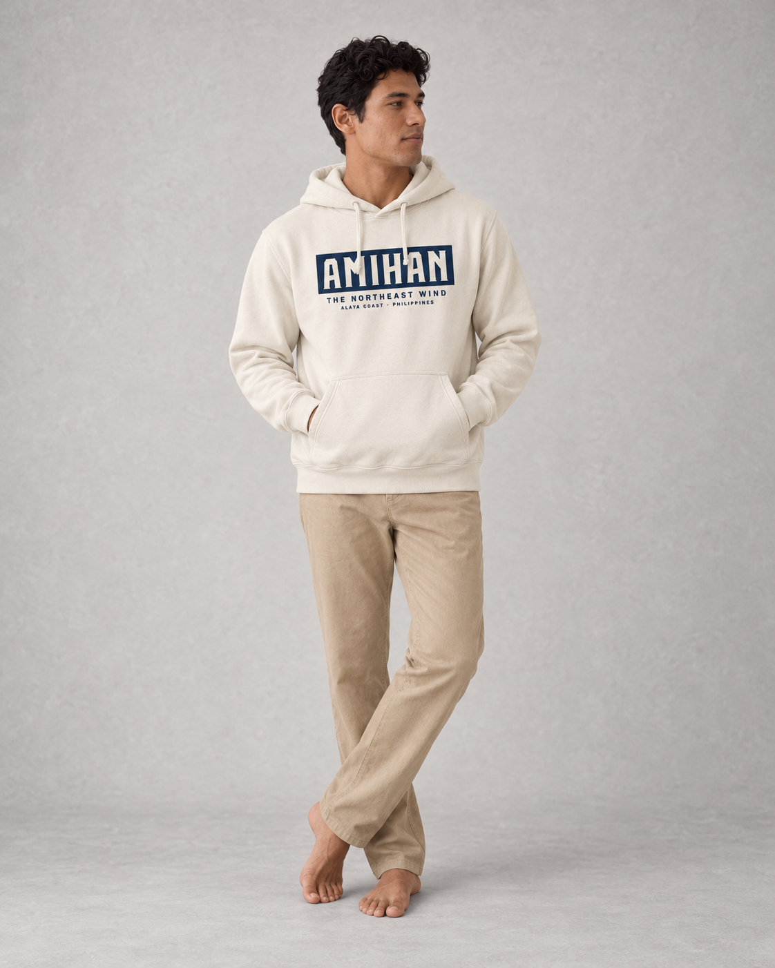 Amihan Hoodie in Bone, front on model with navy typographic print