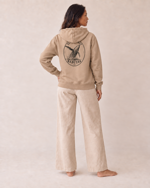 Babuyan Humpback Hoodie in Sandstone, back on model with black whale print