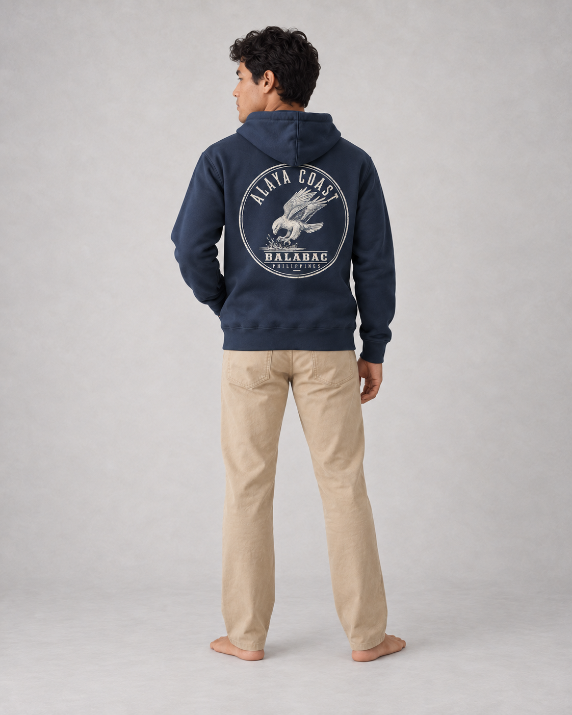 Balabac Sea Eagle Hoodie in Navy, back on model with ivory eagle print