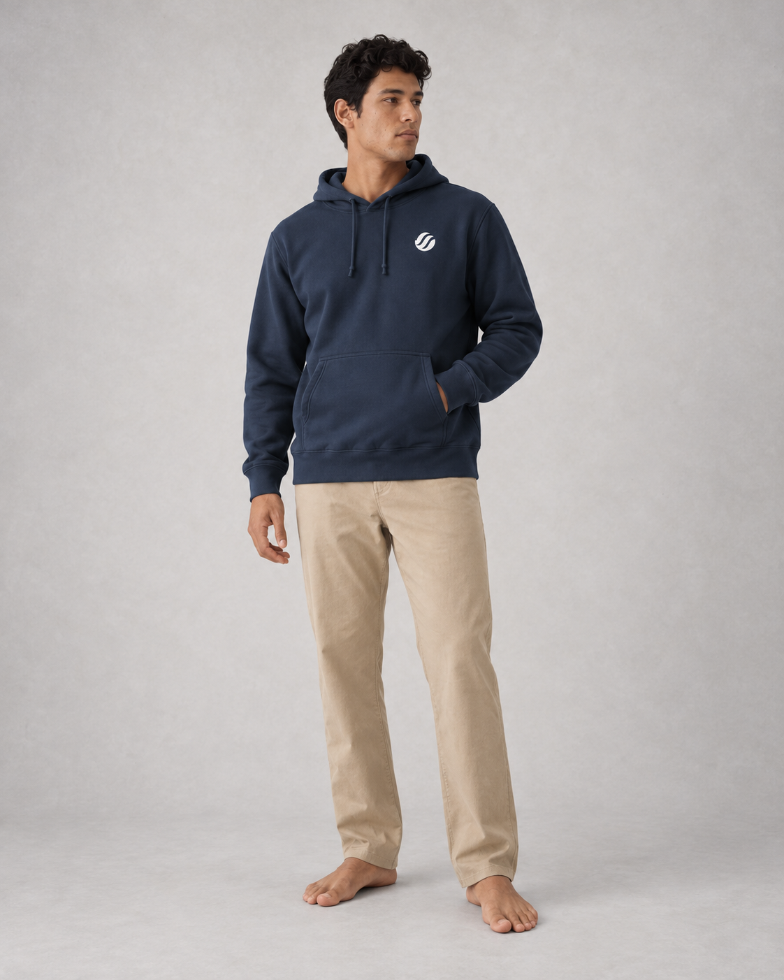 Balabac Sea Eagle Hoodie in Navy, front on model with ivory printed chest wave