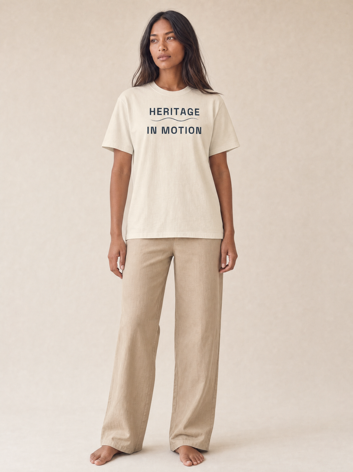 Coast Anthem Tee in Ivory with navy Heritage in Motion print, front on model