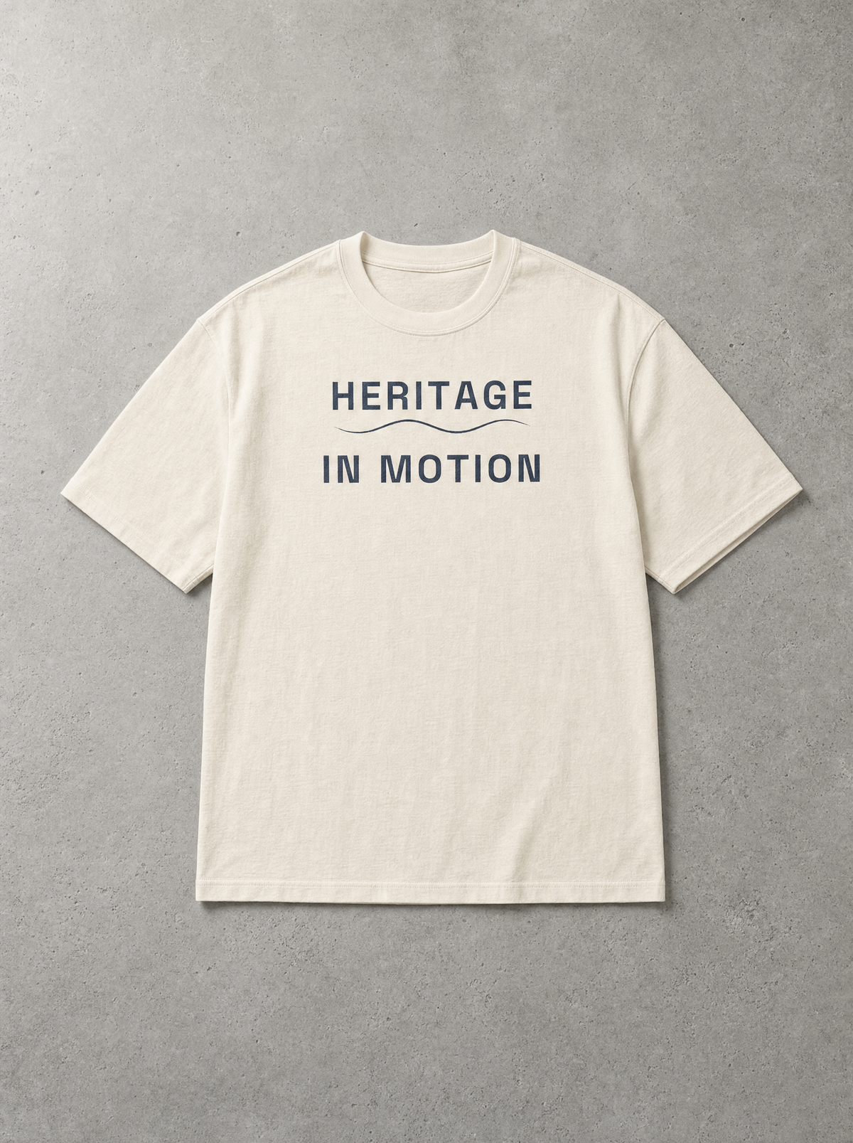 Coast Anthem Tee in Ivory, front flat lay with navy Heritage in Motion print