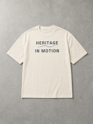 Coast Anthem Tee in Ivory, front flat lay with navy Heritage in Motion print