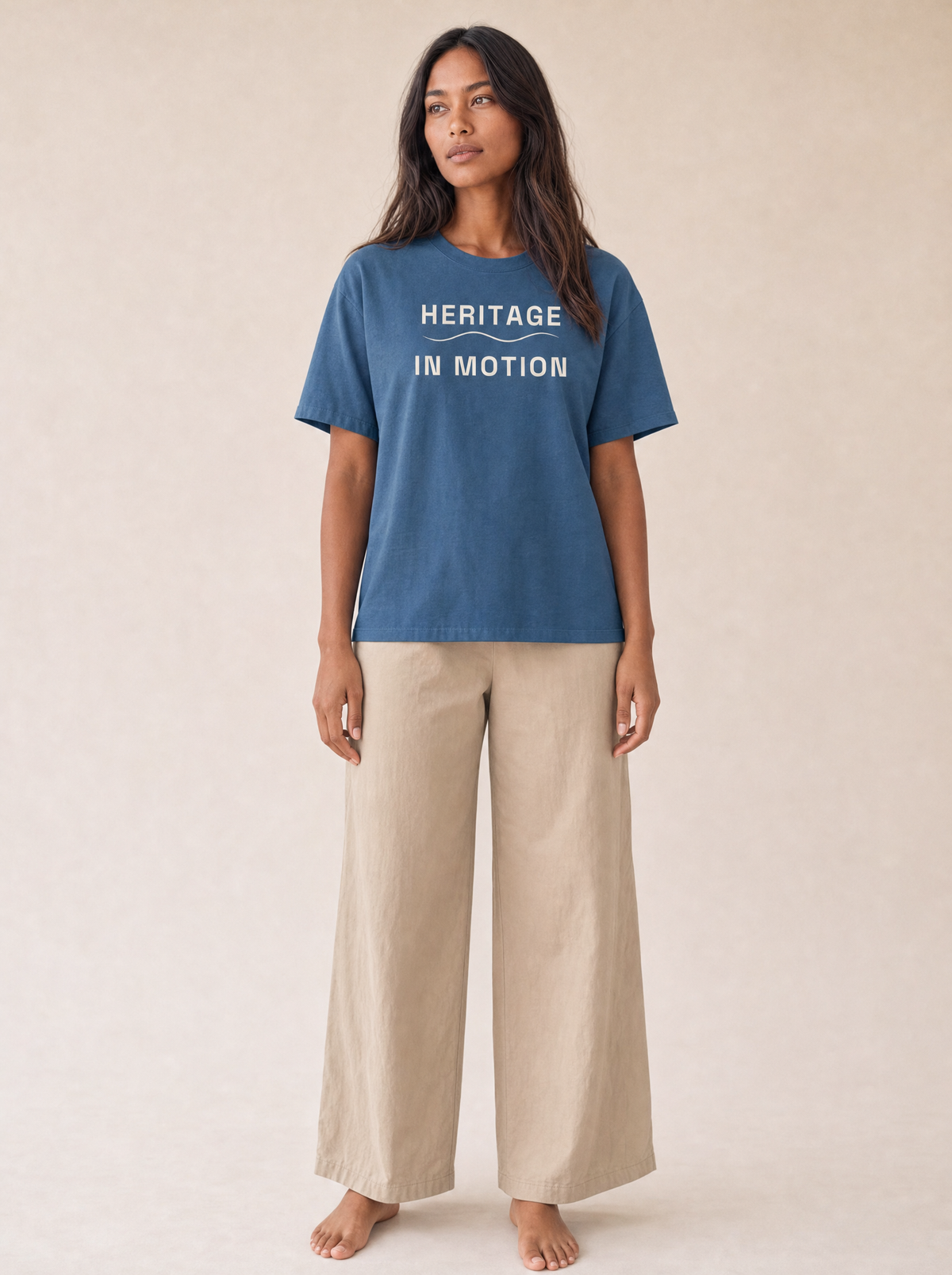 Coast Anthem Tee in Navy with ivory Heritage in Motion print, front on model