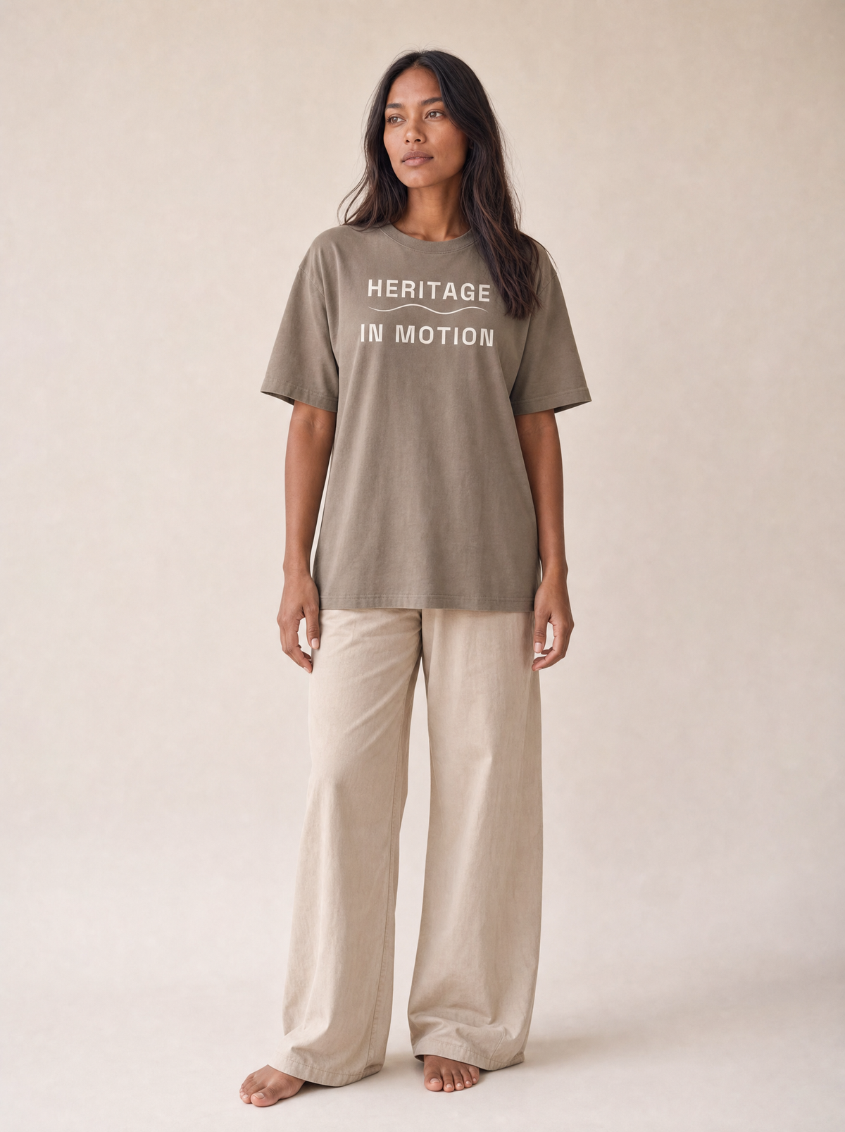 Coast Anthem Tee in Sand with ivory Heritage in Motion print, front on model